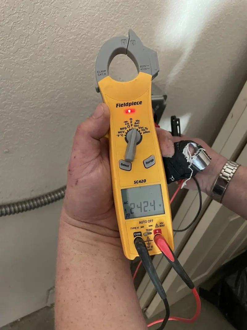 Voltage testing with clamp meter during Hot Tub / Pool Electrical Wiring in Busti
